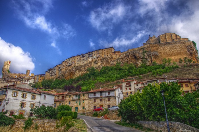 Houses and castle on a rocky hillside in Spain