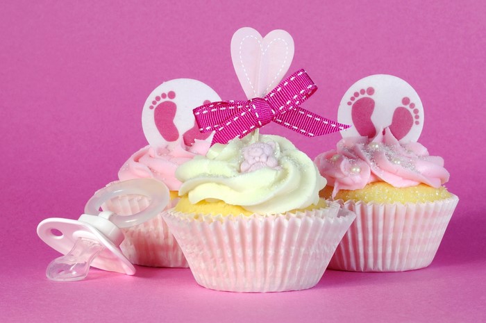 Baby shower cupcakes with pink and yellow frosting