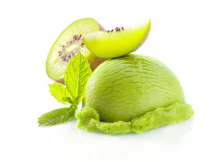 Kiwi ice cream scoop with mint and kiwi slices