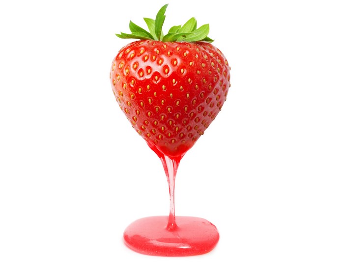 Strawberry with pink liquid