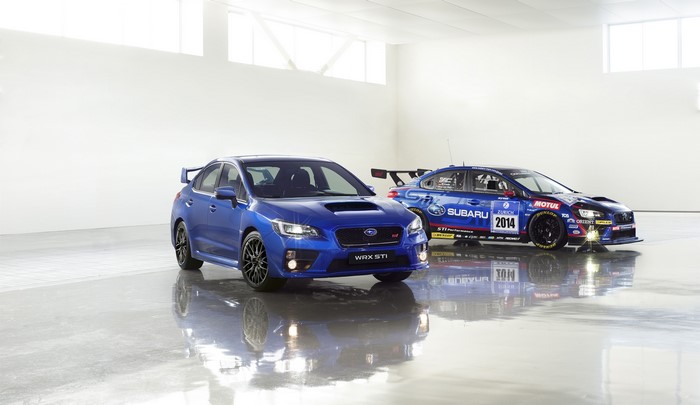 Two blue Subaru WRX STI cars