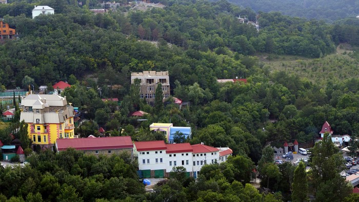 Houses in a forested hillside in Crimea, Russia