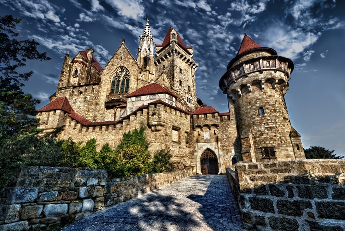 Kreuzenstein Castle in Austria under a cloudy sky