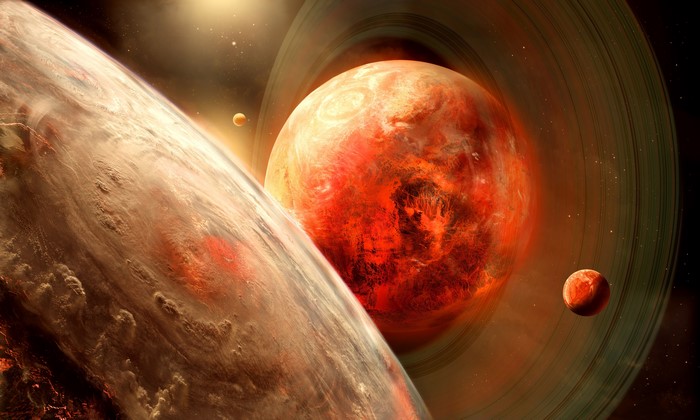Planets with rings and moons in space