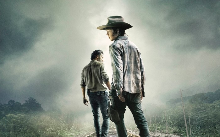 Carl and Rick from The Walking Dead on train tracks