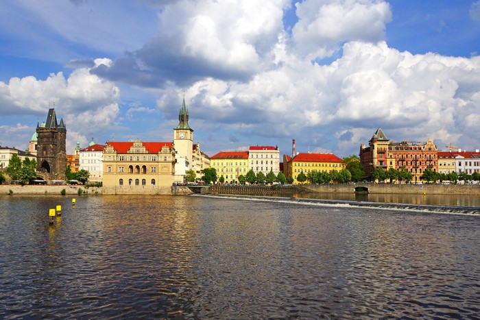Prague cityscape with Vltava River and historical buildings