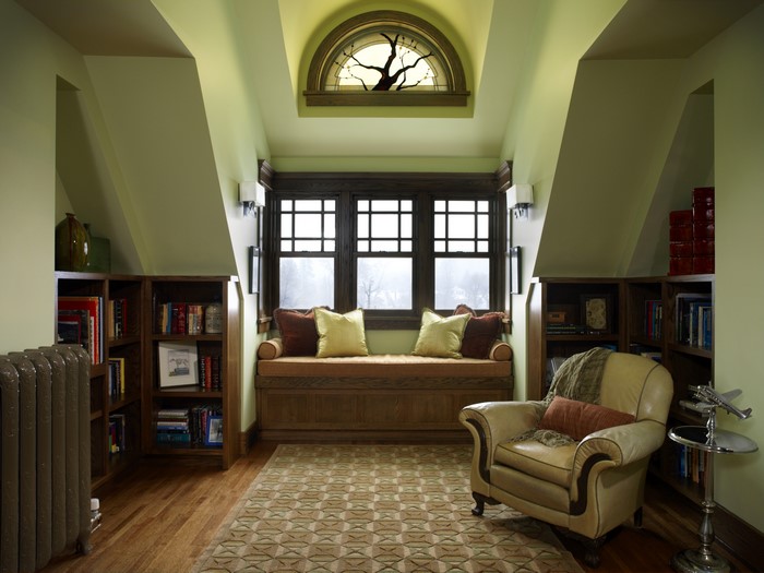 Cozy reading nook with armchair and bookshelves