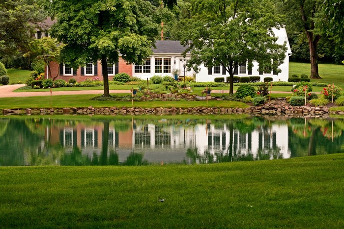 House and pond with reflections