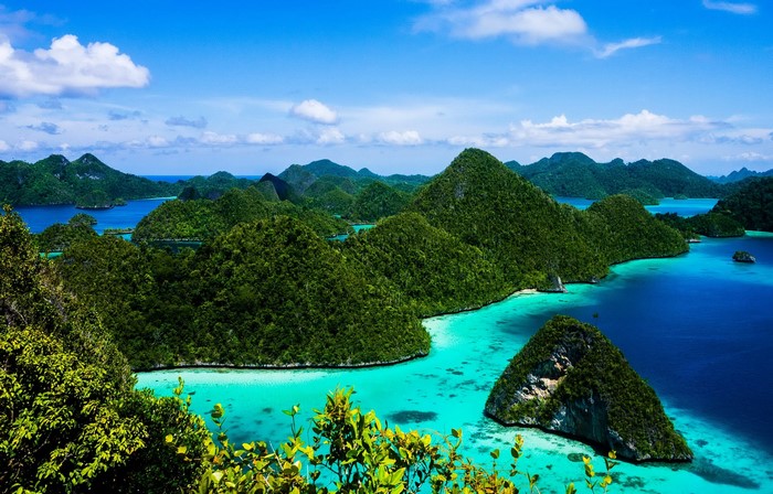 Tropical islands with green mountains and turquoise water