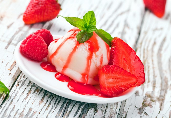 Ice cream with strawberries and raspberries