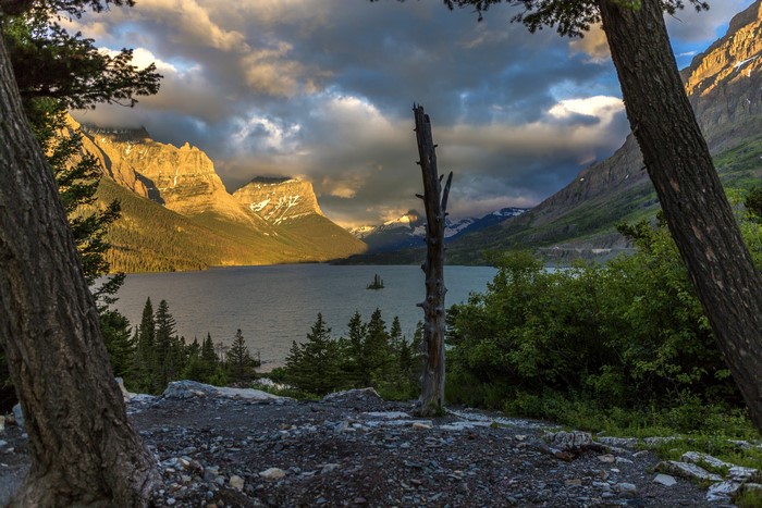 Glacier National Park Mountains and Lake at Sunset