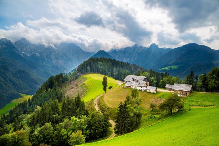 Mountain landscape with houses and forests