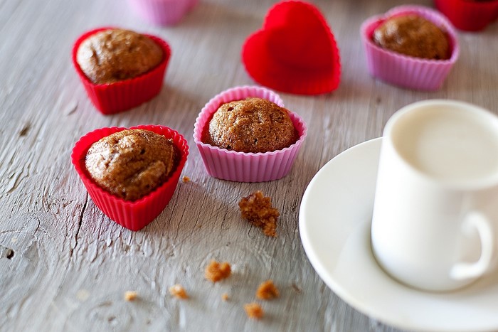 Heart-shaped muffins with a cup of milk