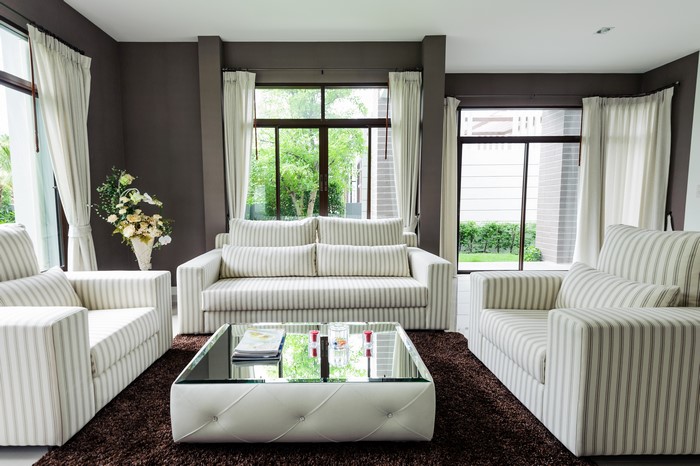 Living room with striped sofas and coffee table