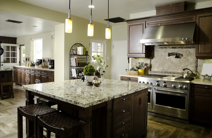 Kitchen with Island and Stainless Steel Appliances