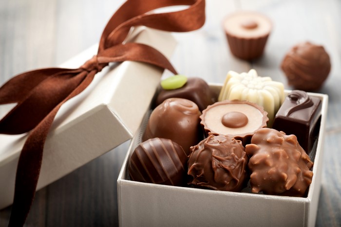 Box of assorted chocolates with a ribbon