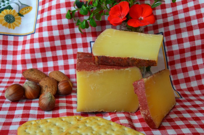 Cheese, Nuts, and Crackers on a Red Gingham Tablecloth