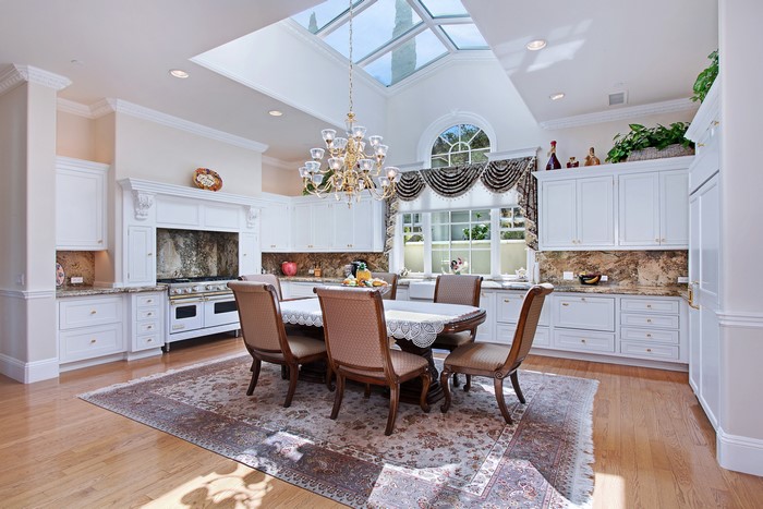 Kitchen with dining table and chandelier
