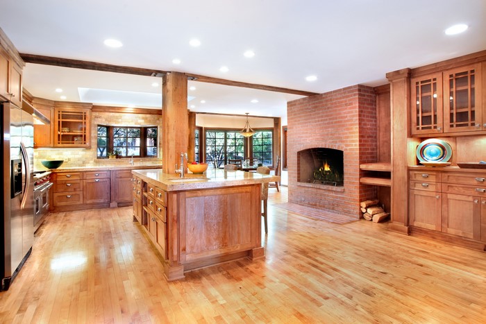 Interior Kitchen with Brick Fireplace and Island