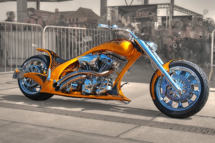 Custom orange motorcycle with chrome details