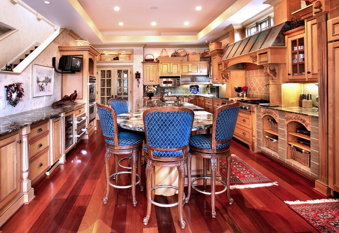 Kitchen with Island and Blue Upholstered Bar Stools