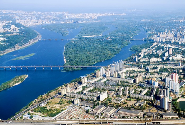 Aerial view of a city and river with bridges