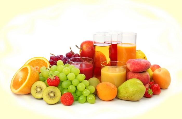 Fresh Assortment of Fruits and Juices in Glasses