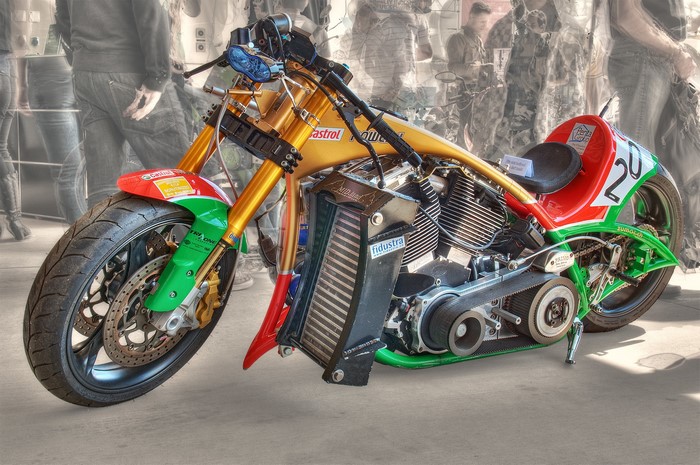 Custom motorcycle with gold frame and red, green, white paint