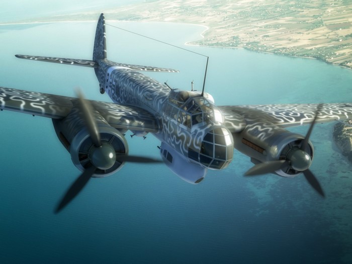 Junkers Ju 88 bomber flying over a coastline