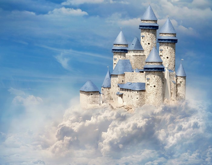 Castle on clouds in blue sky