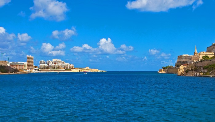 Valletta, Malta cityscape with harbor and blue sky