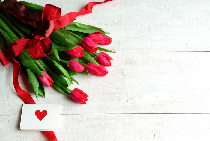 Tulips with a red bow and heart card