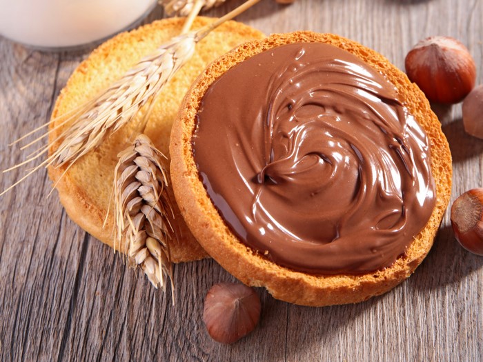 Toast with chocolate spread and hazelnuts