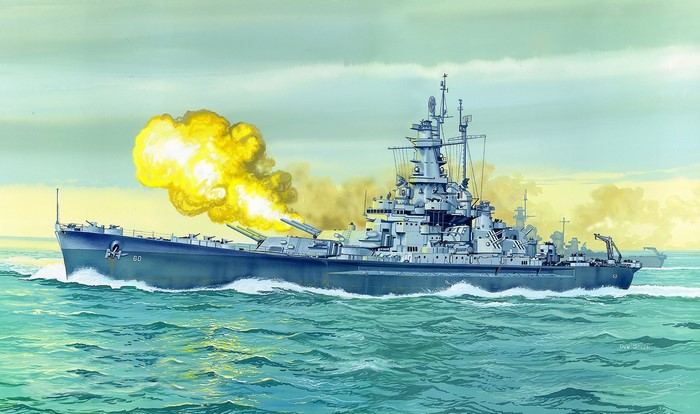 Battleship firing its guns at sea