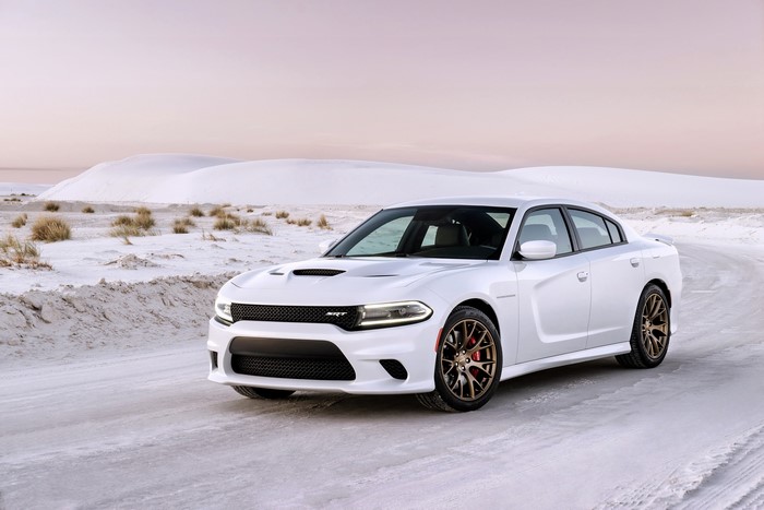 White Dodge Charger SRT Hellcat in a snowy landscape