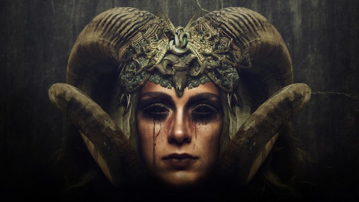 Woman with large horns and ornate headdress