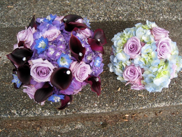 Purple and blue bouquets with calla lilies and roses