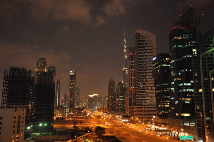 Dubai skyscrapers and roads at night