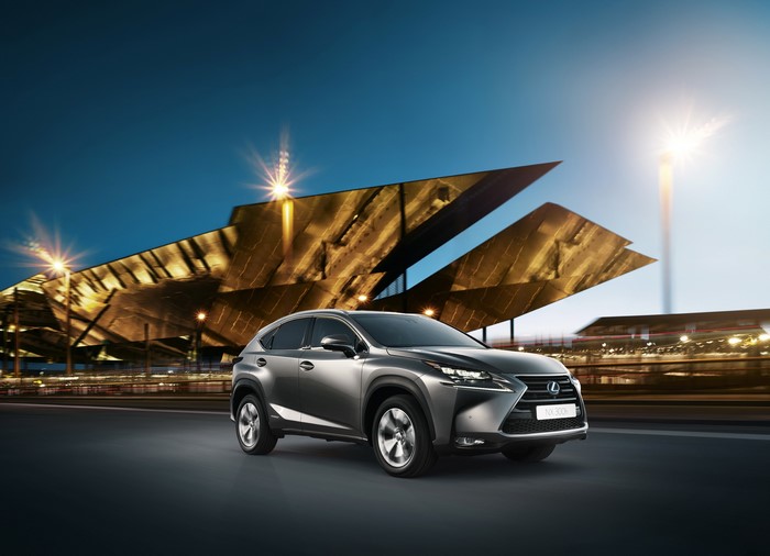 Grey Lexus NX 300h F-Sport parked at night