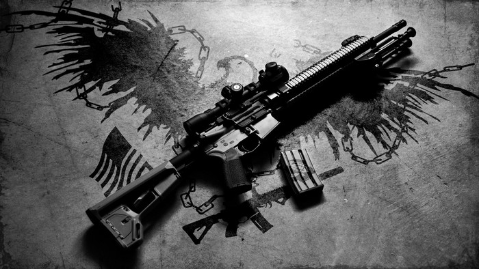 M4 rifle with scope and magazine on grunge background