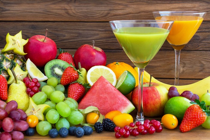 Assortment of Fresh Fruits and Juices in Stemware