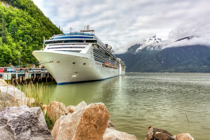 Cruise Liner Docked Near Mountains