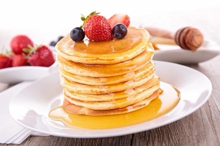 Pancakes with Strawberries, Blueberries, and Honey