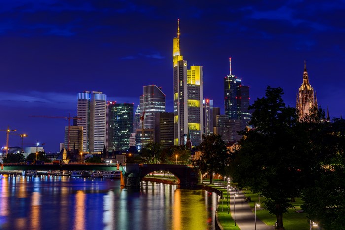 Frankfurt Skyline at Night with River and Bridge