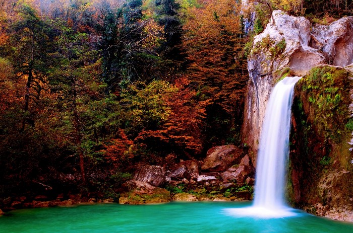 Autumn Waterfall in a Forest