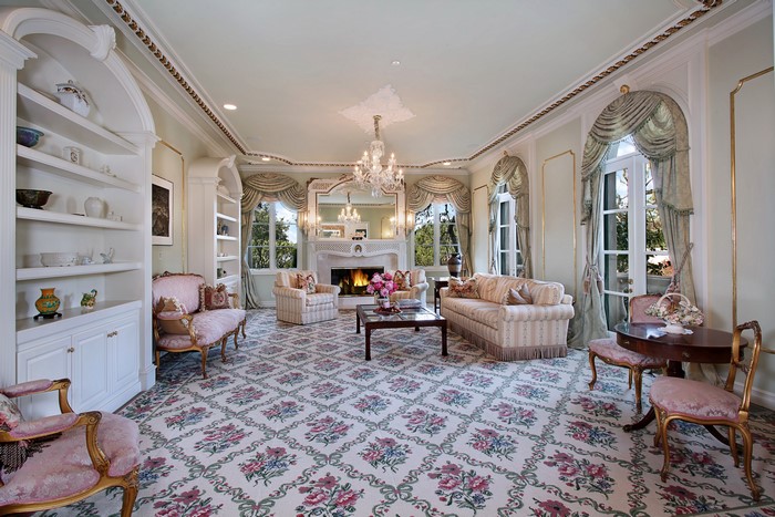 Elegant Living Room with Fireplace and Chandelier