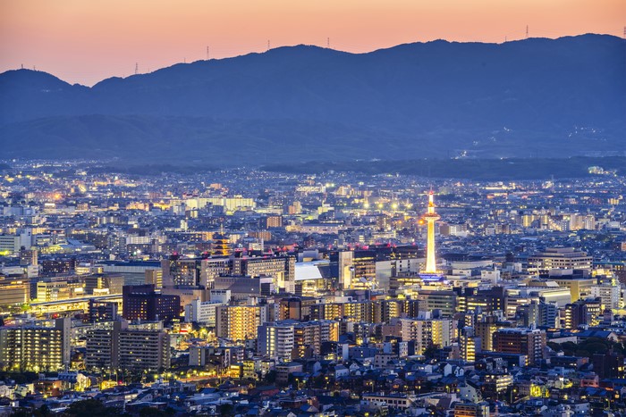 Kyoto cityscape with Kyoto Tower at dusk