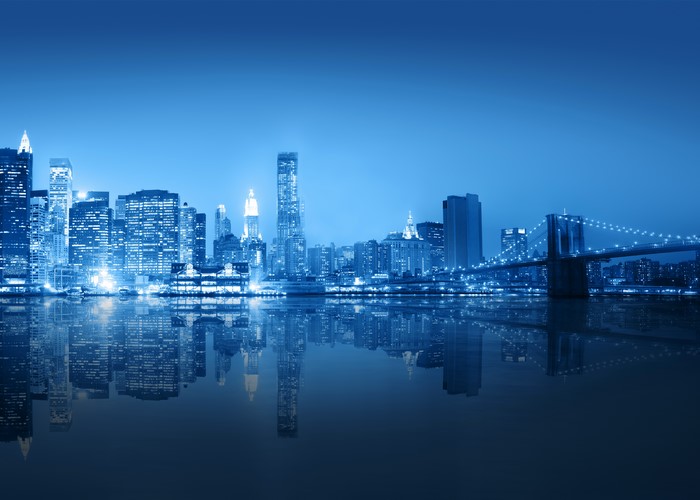New York City skyline and Brooklyn Bridge at night