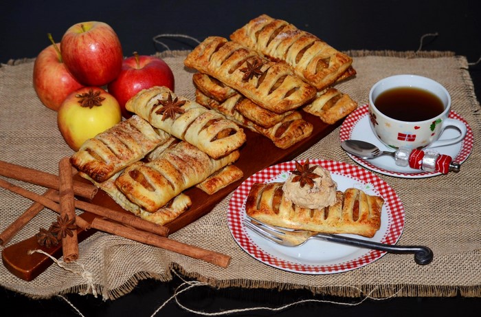 Apple pastries with tea and apples
