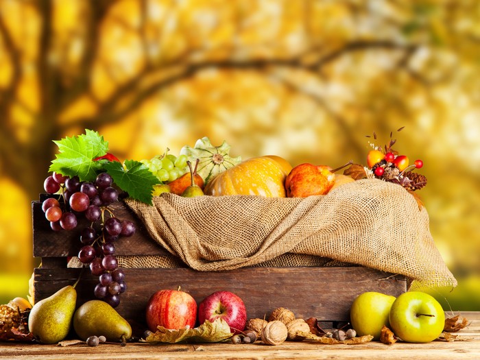Autumn Harvest Fruits and Nuts in Wooden Crate